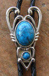 SYMBOL BOLO TIE